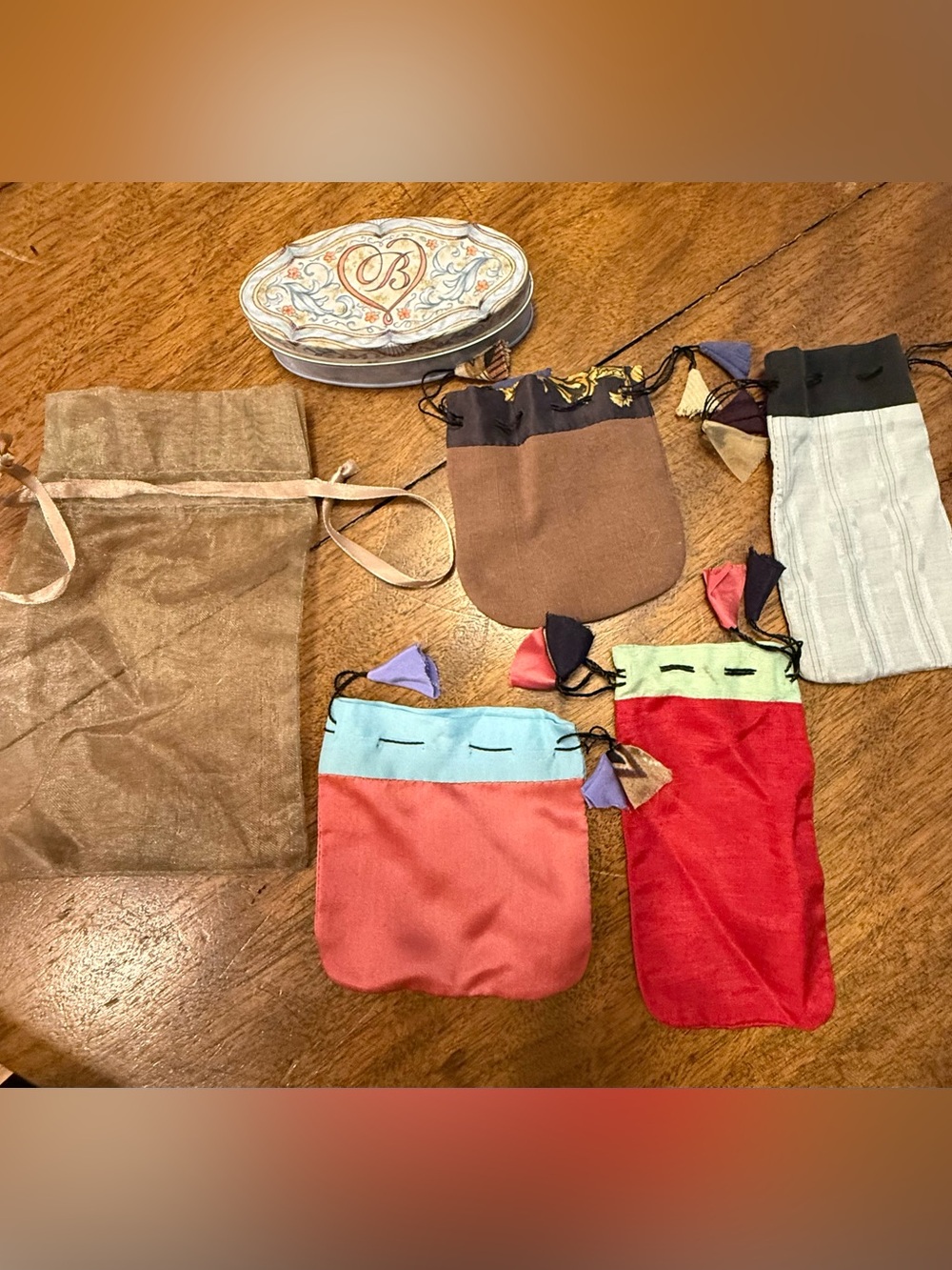 Jewelry bags and one tin from Brighton